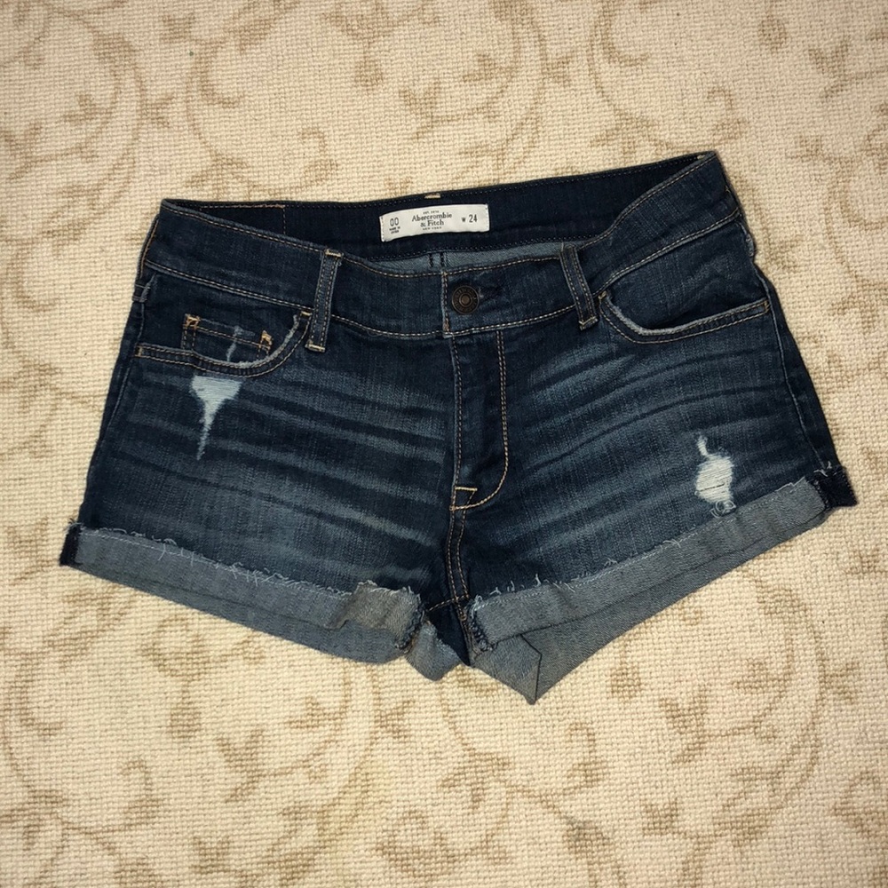 jean shorts w 2 little patches of rips